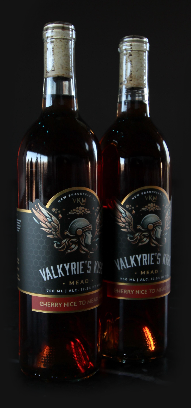 Two bottles of Valkyrie's Kiss Mead, cherry flavor.